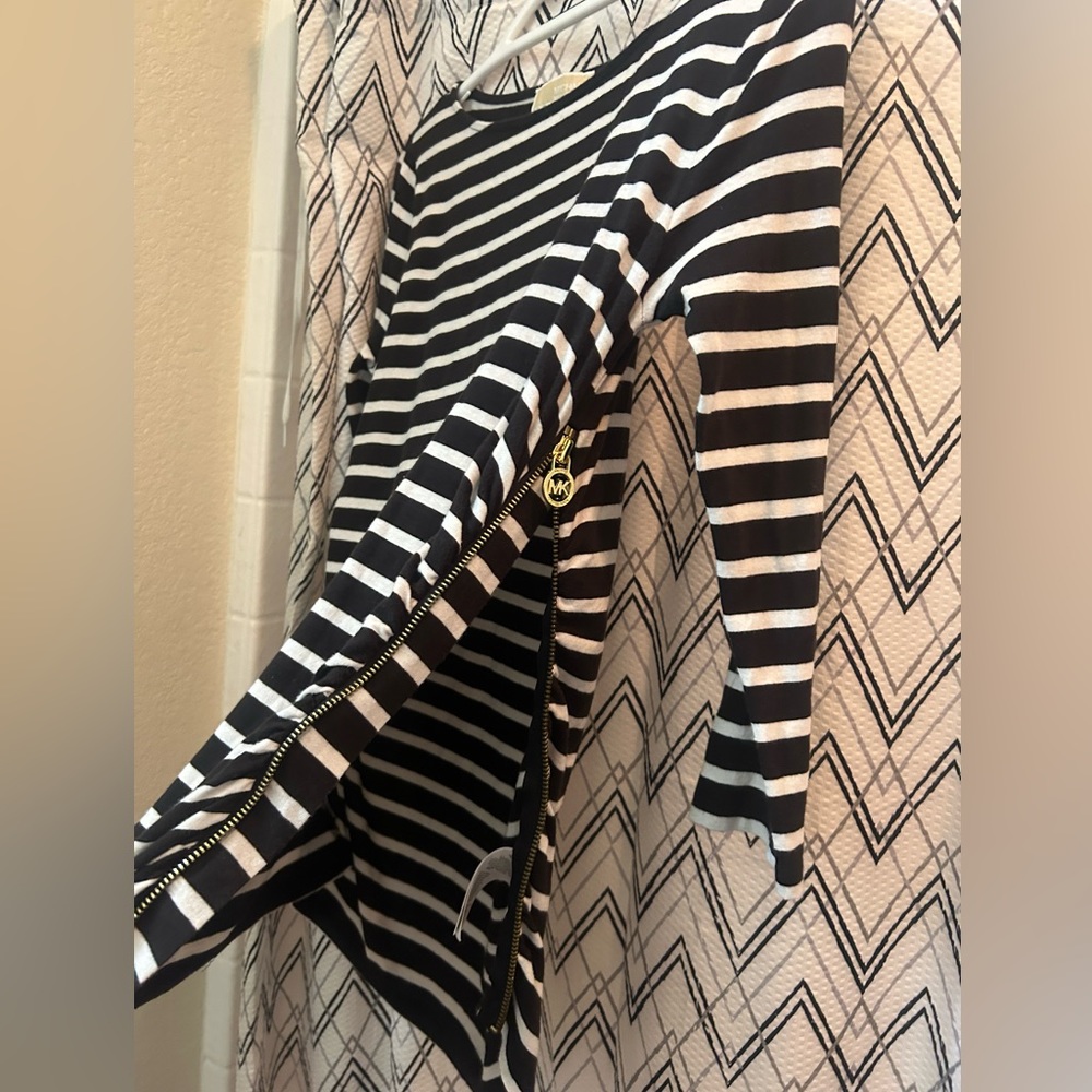 Woman’s Michael Kors size M quarter sleeve shirt